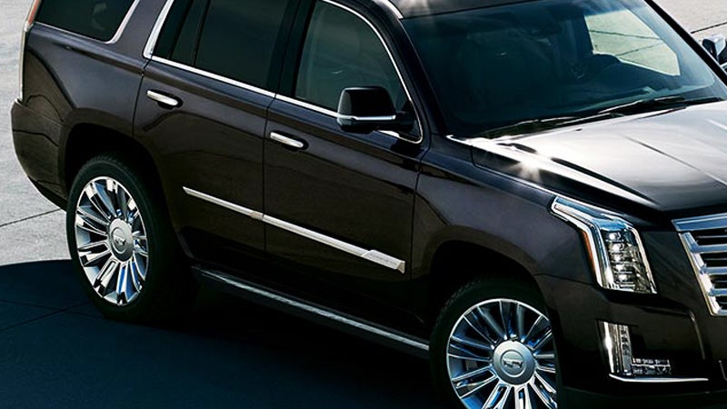 Black Cadillac SUV with chrome trim