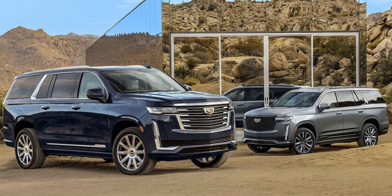 A black and silver Escalade-ESVhowcasing their sleek designs